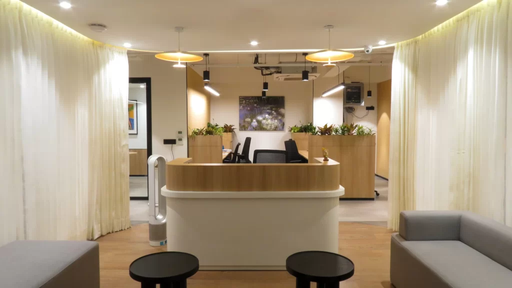 Shree Spaace Solution corporate reception area interior with modern desk and lighting in Gurgao  office
